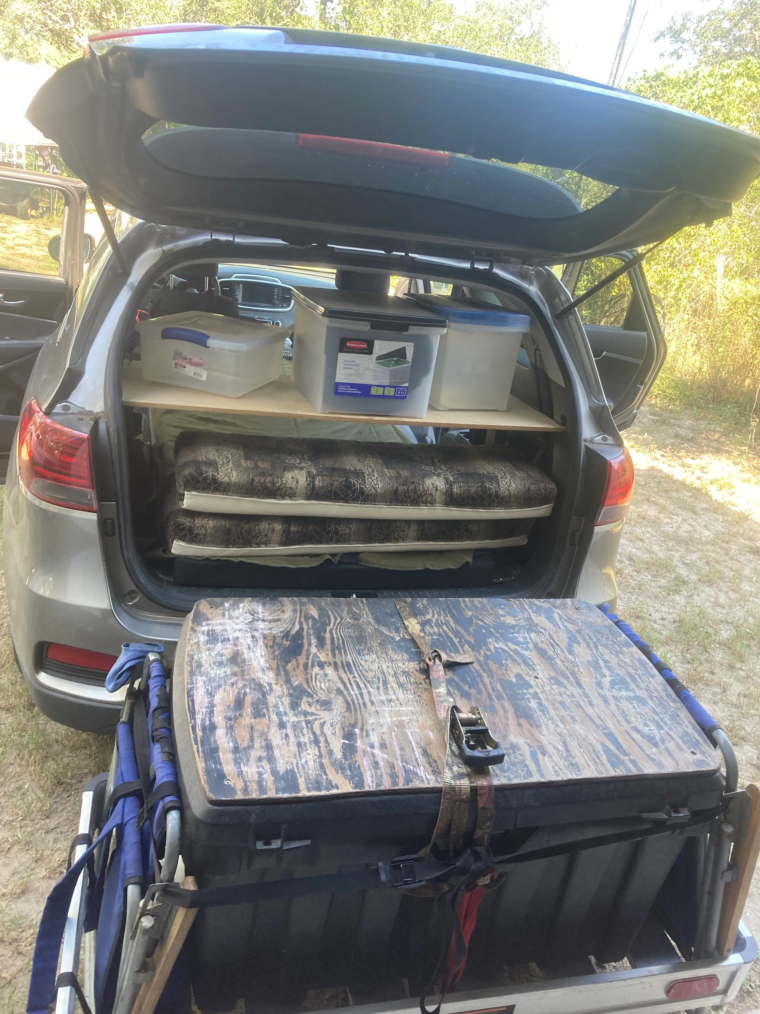 Running gear and burners go in the outside box — food always stays in the car