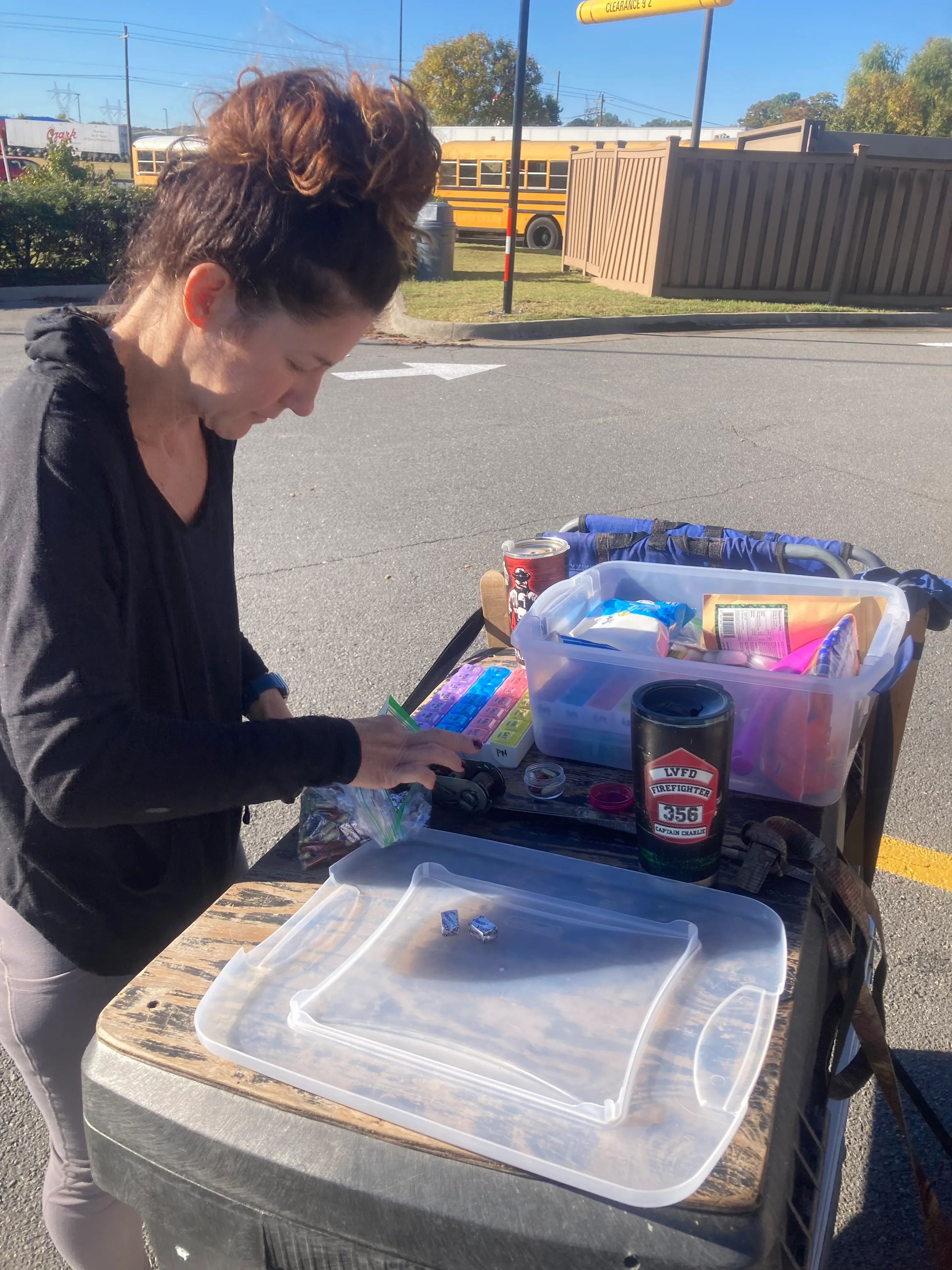 Food and supplies organized in bins — the KISS system