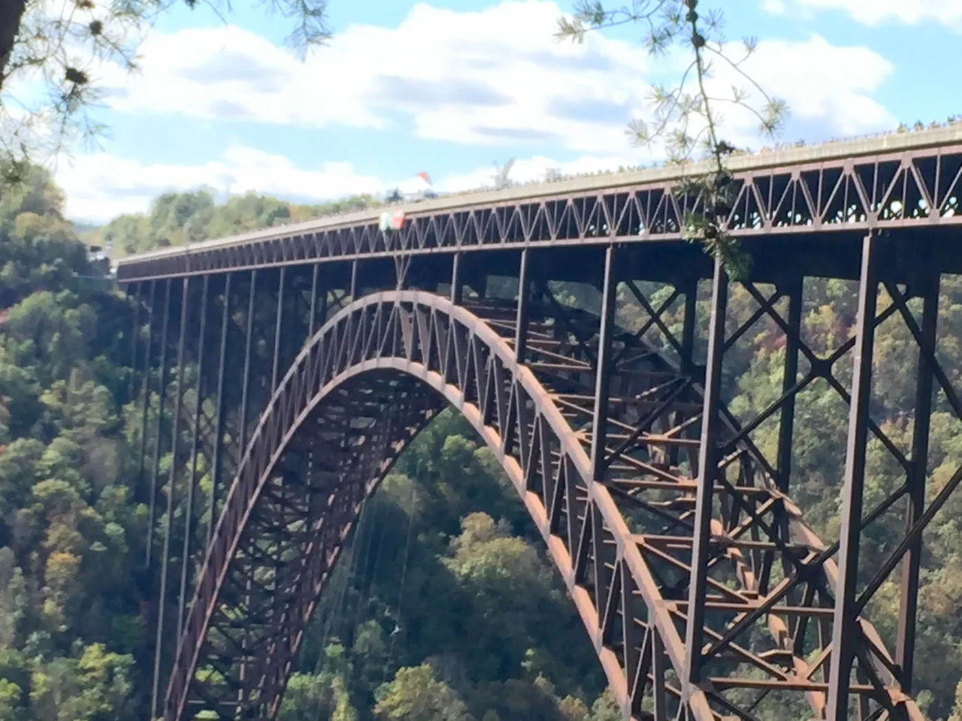 The New River Gorge Bridge from below — 876 feet up, and there are routes under it