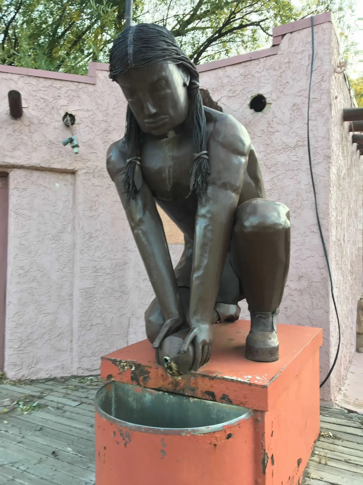 One of eight public mineral springs in downtown Manitou Springs — each one free, each one different