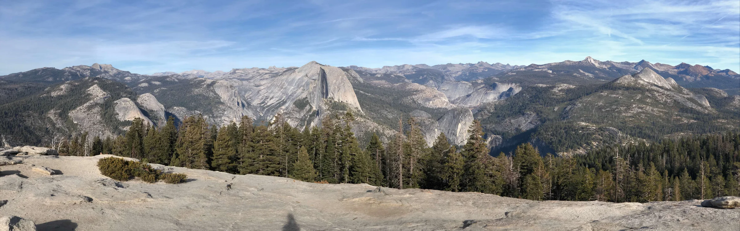 Half Dome from near Sentinel Dome — the full Sierra Nevada in the background, the valley below.