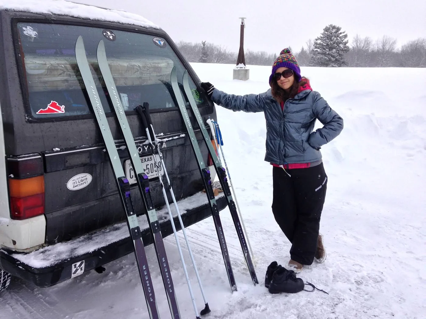 Polly with the skis on the van — before the dog got involved and everything went sideways