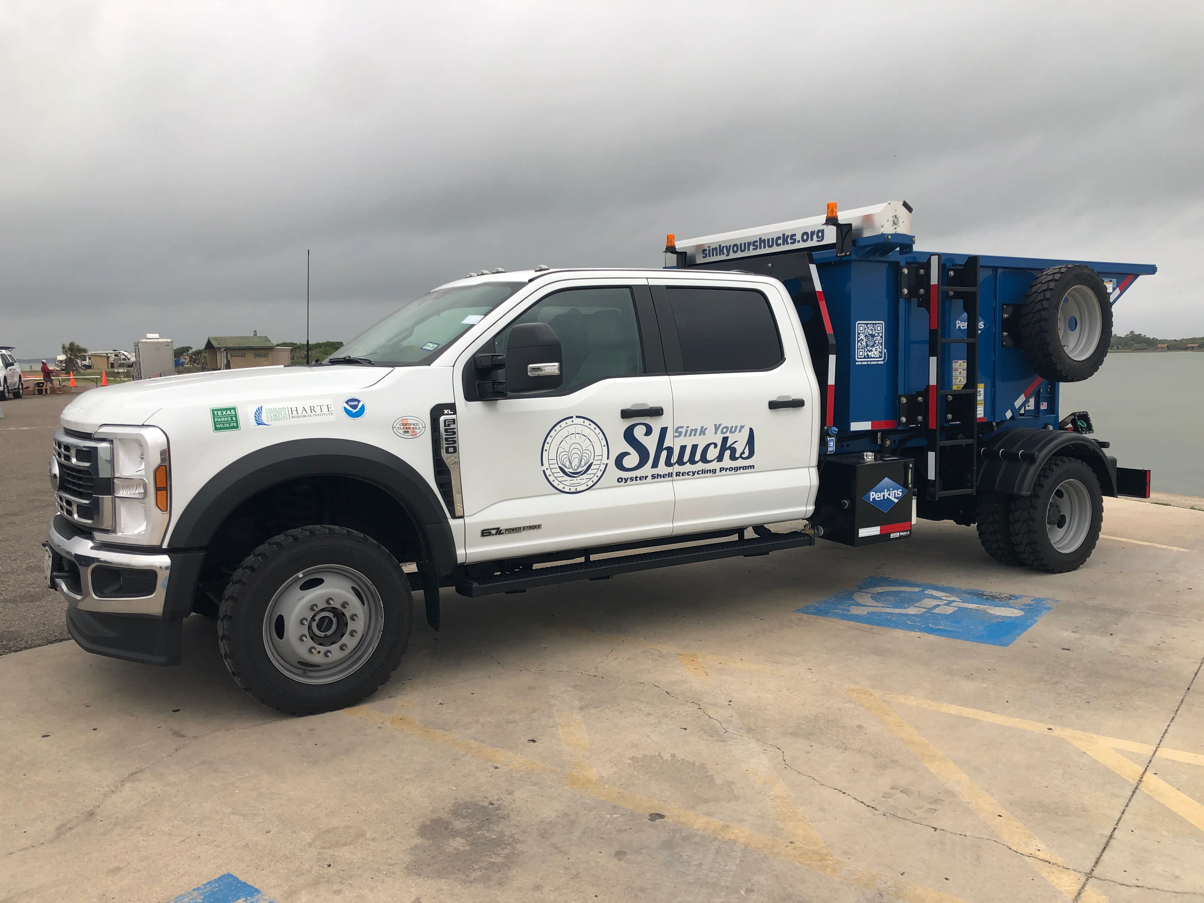 A Sink Your Shucks oyster shell recycling truck parked at Goose Island State Park, Texas