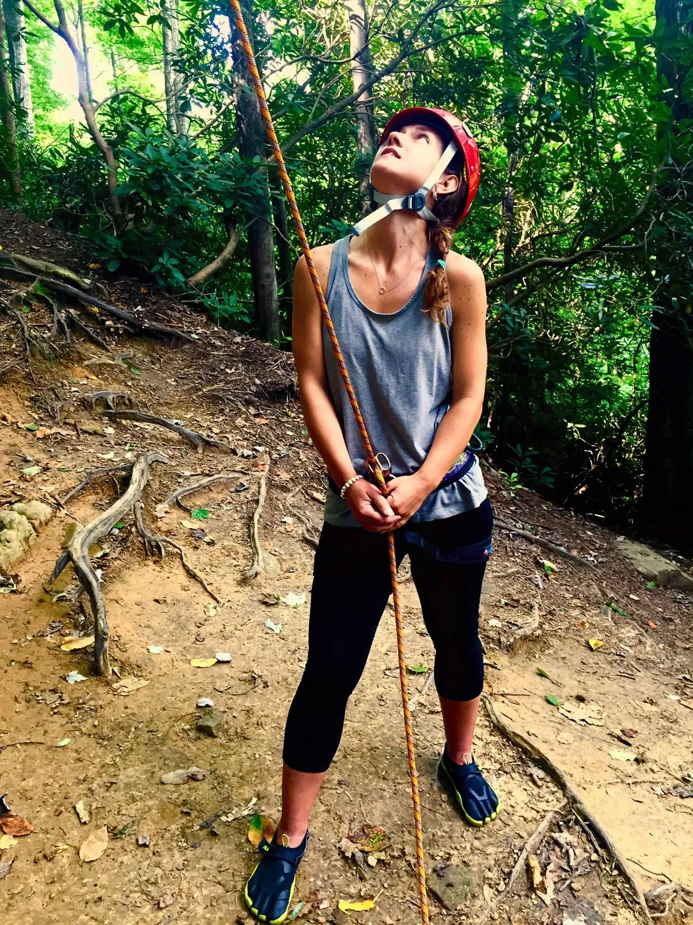Polly belaying — learned it from a wheelchair, never stopped