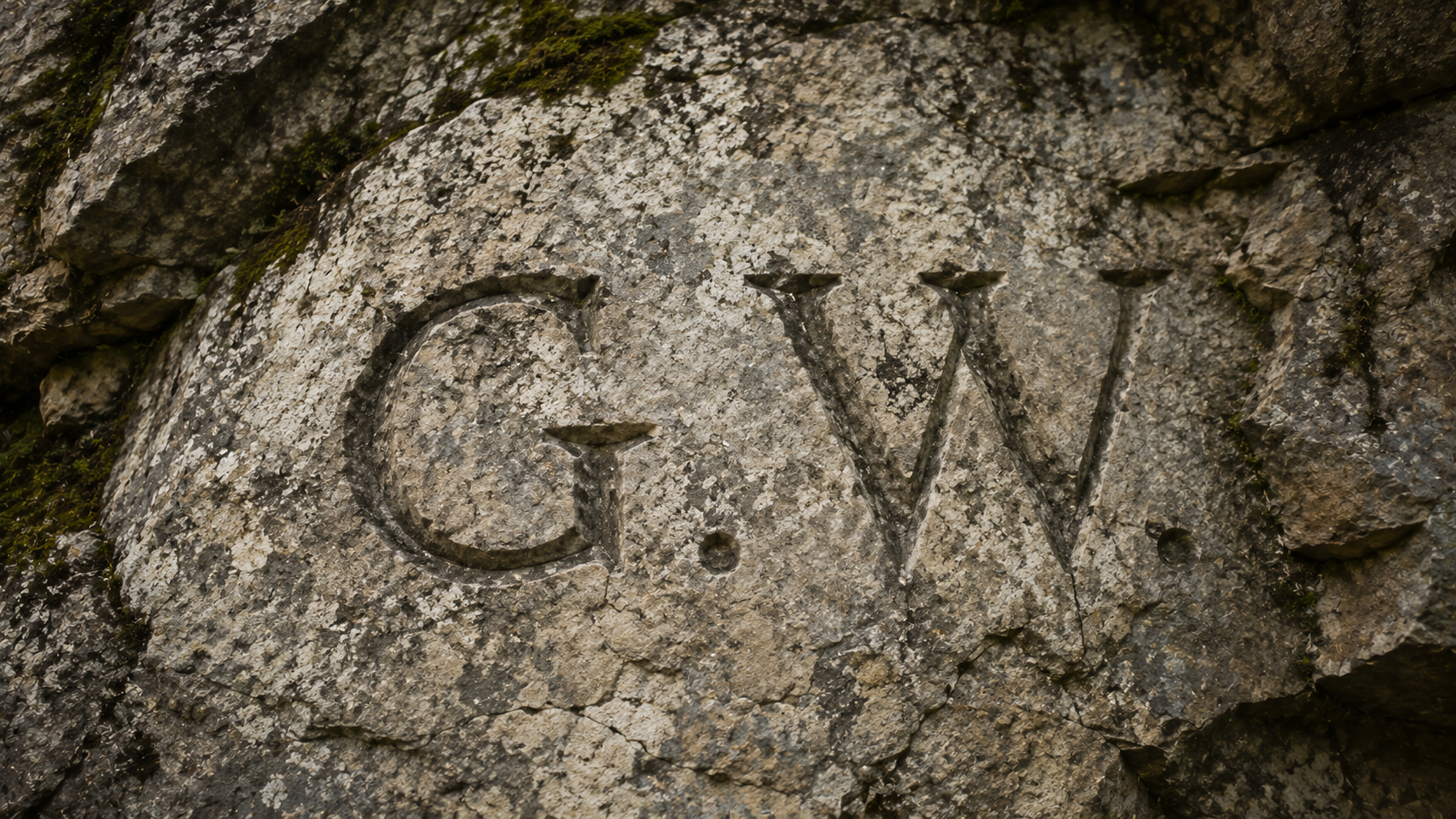 G.W. initials carved 23 feet up the limestone wall at Natural Bridge, Virginia — higher than any other visitor